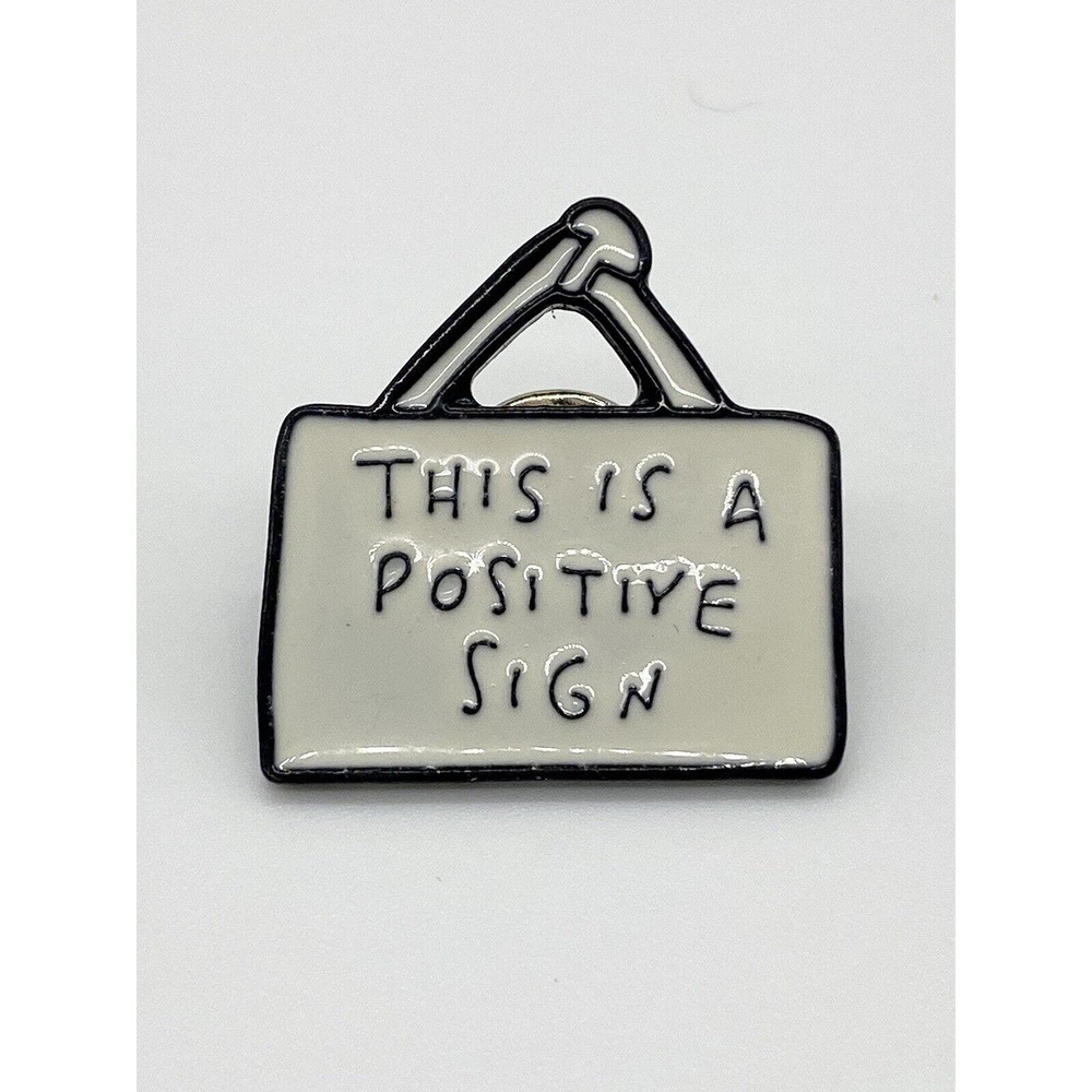 This is a Positive Sign Fun Humor Lapel Pin
